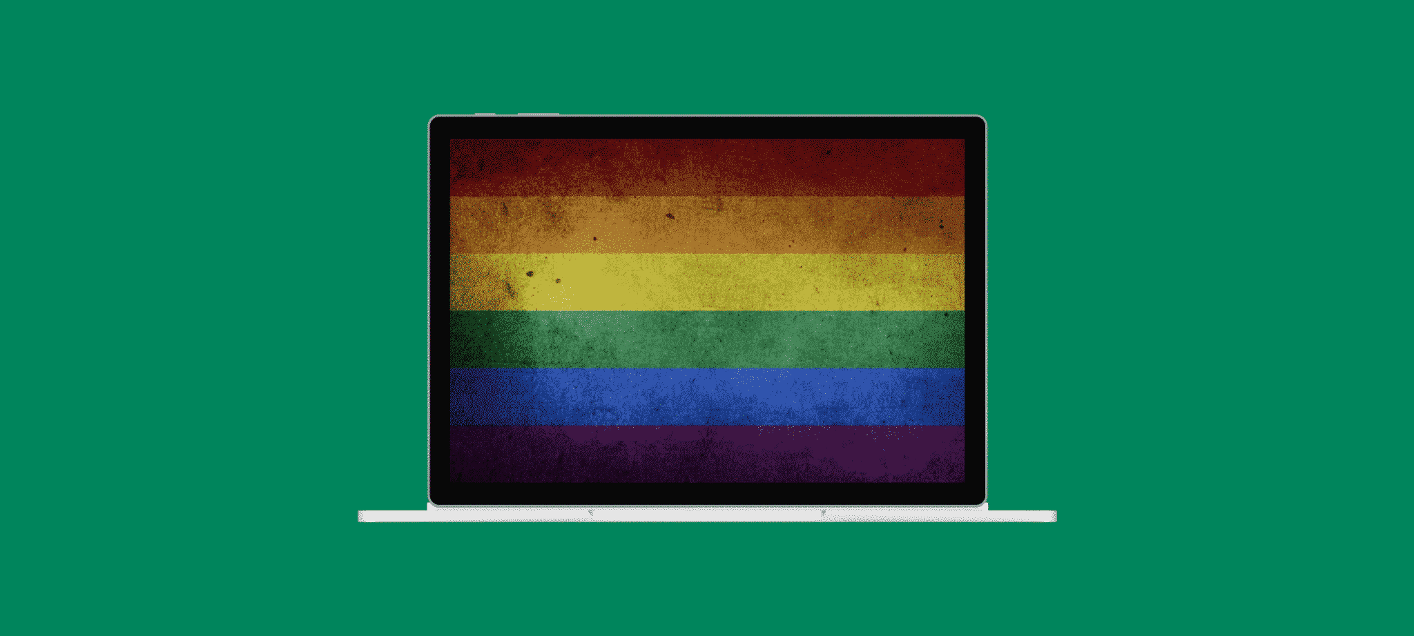 Computer with a big pride flag on it's screen.